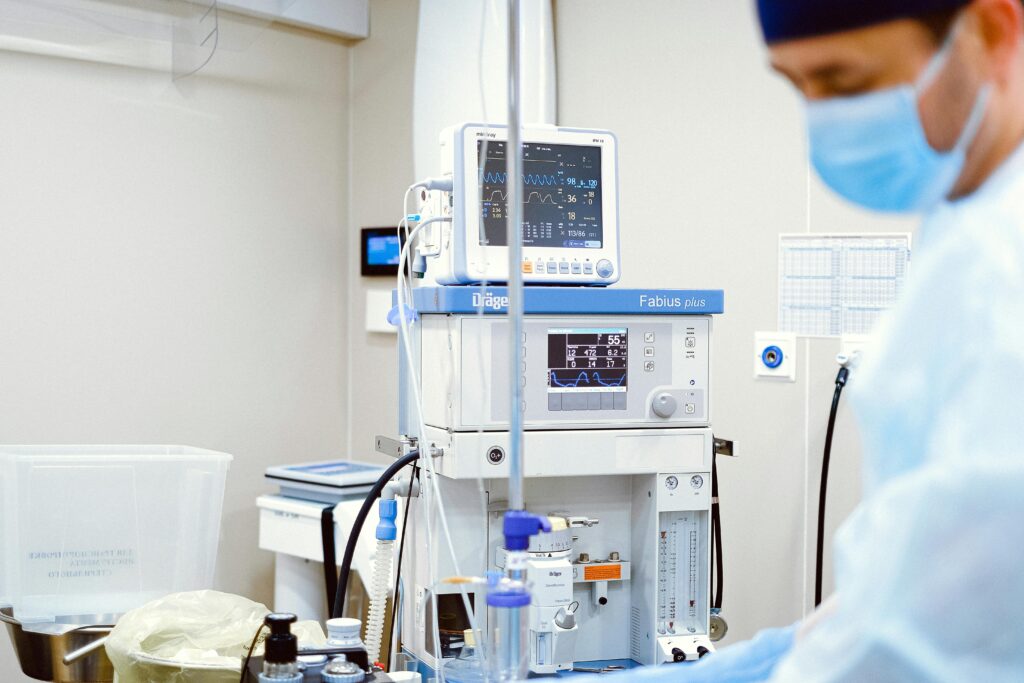 Close-up of advanced medical equipment in a sterile operating room setting.