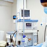 Close-up of advanced medical equipment in a sterile operating room setting.