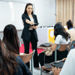 University lecturer teaching students in classroom
